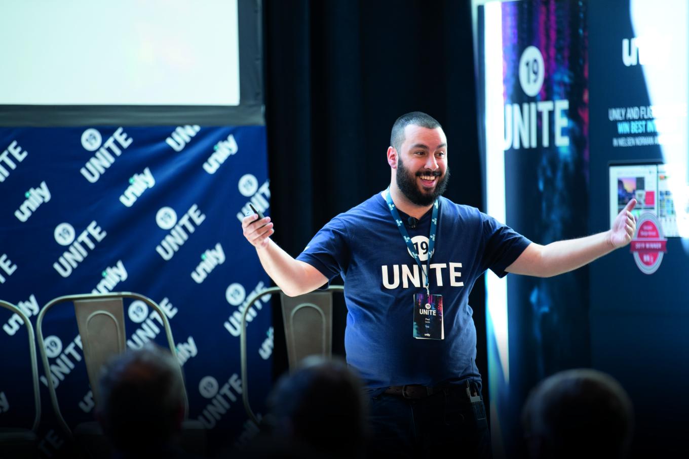 A member of the Unily team demonstrating the company's platform at a conference