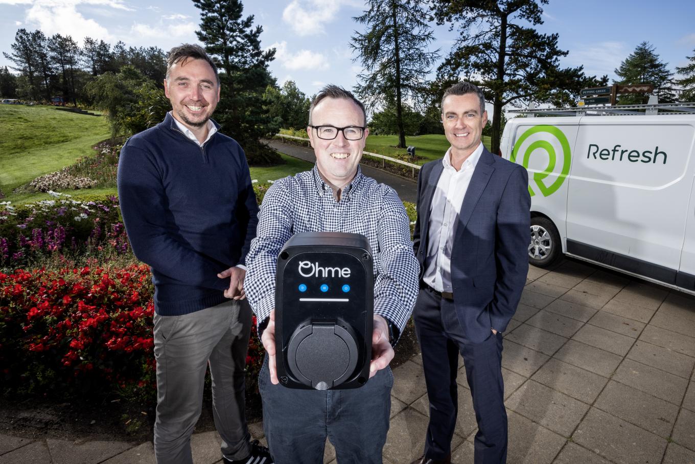 Photo of Refresh NI Finance Director Jack Peel with Mark Sterritt from British Business Bank and Neil McCabe from Whiterock standing outside next to a Refresh NI van
