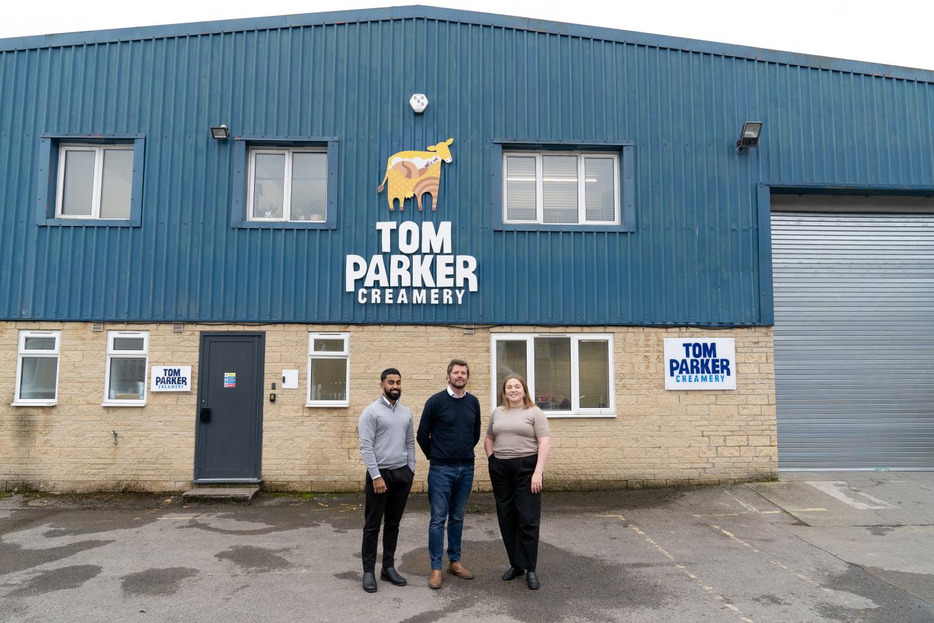 Photo of outside Tom Parker Creamery with Rafi Khan of Maven, Rob Yates, CEO of Tom Parker Creamery and Lizzie Upton of British Business Bank