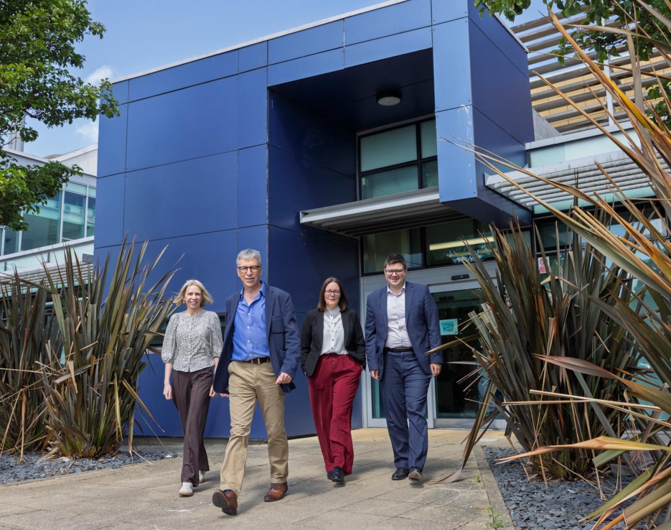 aXenic founders outside building