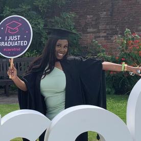 efe koomson in graduation clothing 