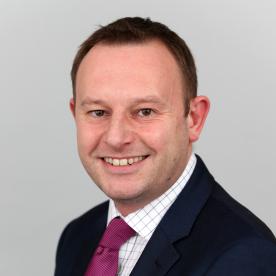 Portrait image of Mike Ginnelly, Managing Director,Compliance